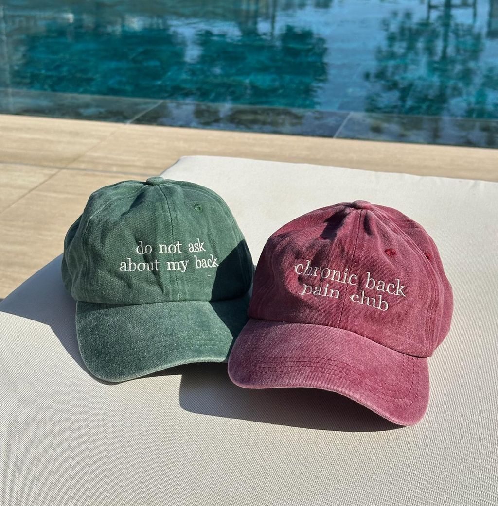 Purple “Chronic Back Pain Club” cap